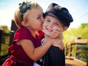 cute boy girl kissing kids