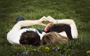 kissing on heart hand grass